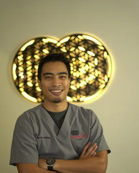 Portrait of Dr Wan Afdzal, founder and principal doctor at Remedine Clinic