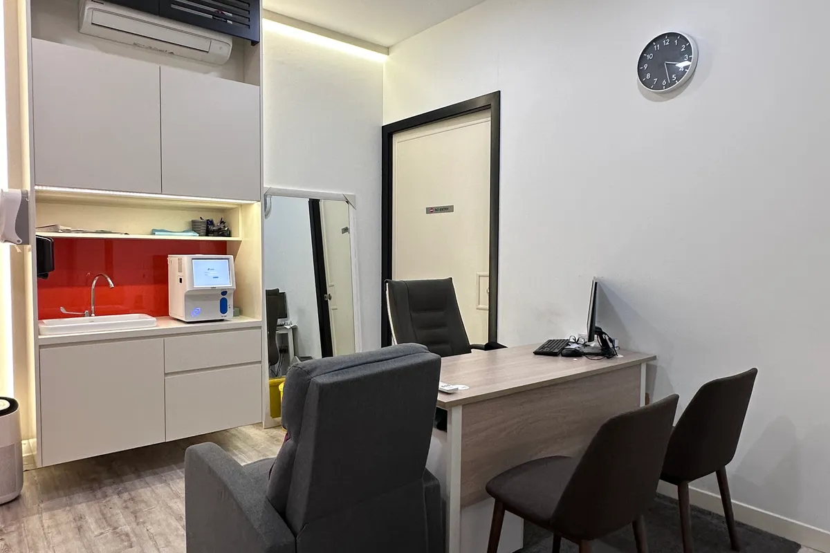 Consultation room at Remedine Clinic with patient armchair