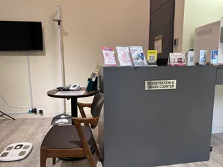 Body composition scale and blood pressure monitor at the triage corner