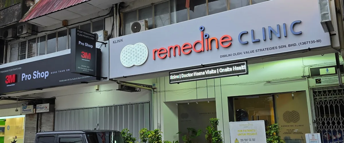 Persiaran Zaaba street view with Remedine Clinic among neighbourhood shops