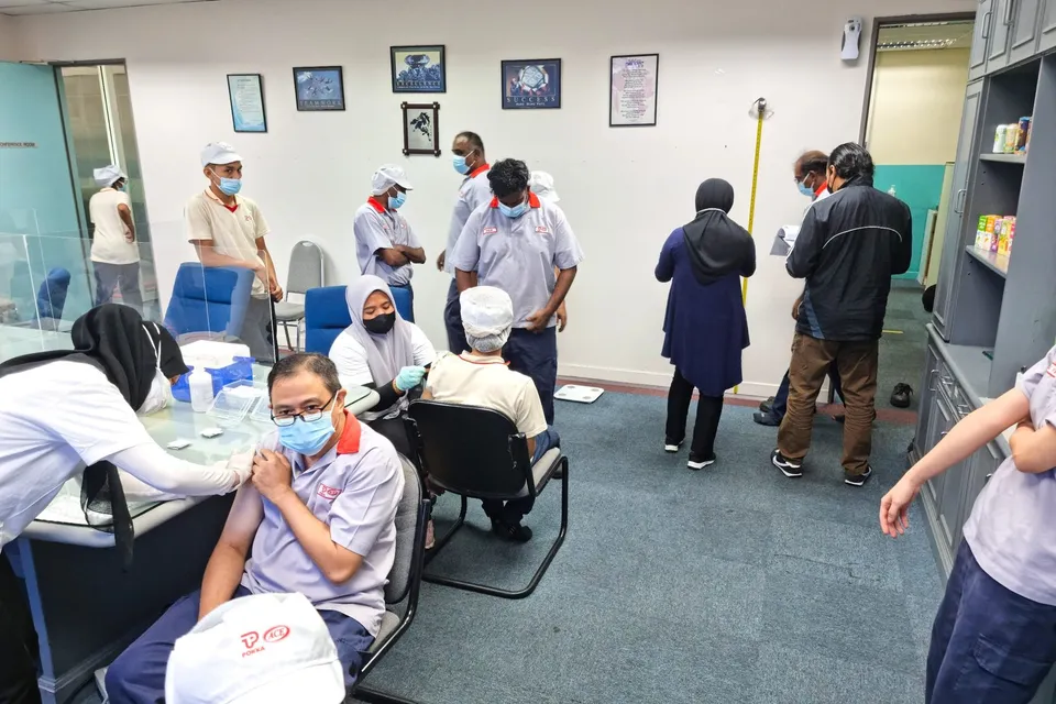 Two vaccination stations running at once during a company onsite visit