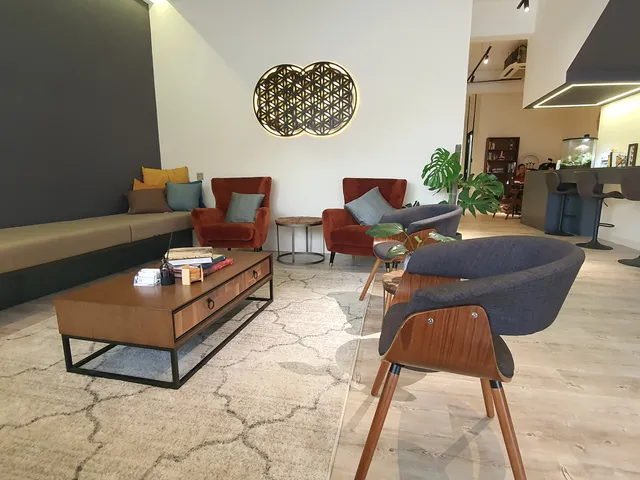 Waiting lounge with armchairs at Remedine Clinic
