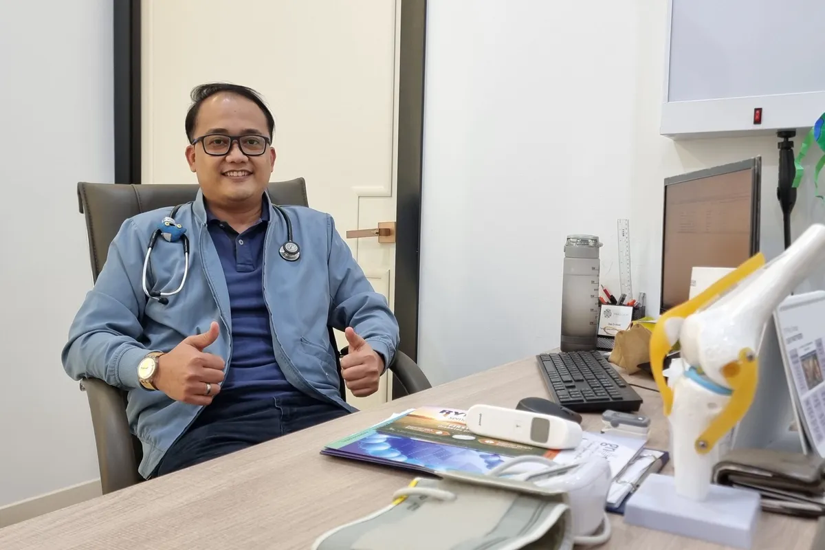 Dr Mohd Sufian at his consultation desk at Remedine Clinic